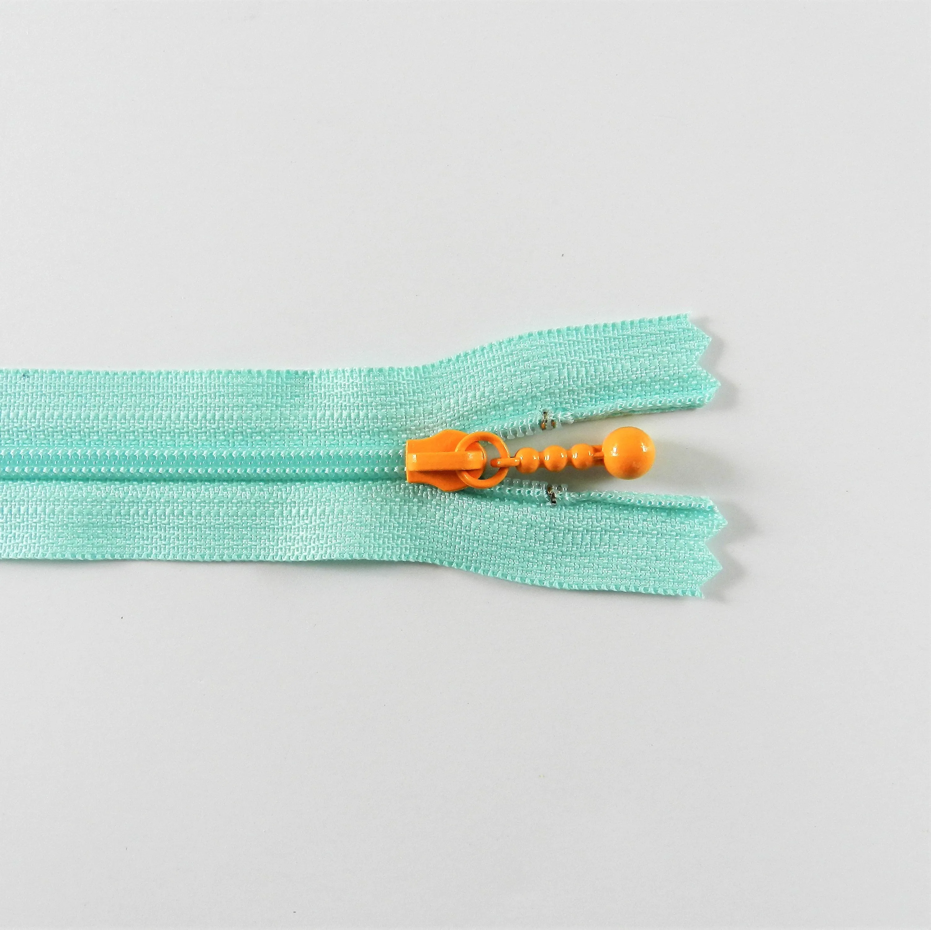 Pearl Drop Zipper - Pastel - Light Blue with Orange Pull